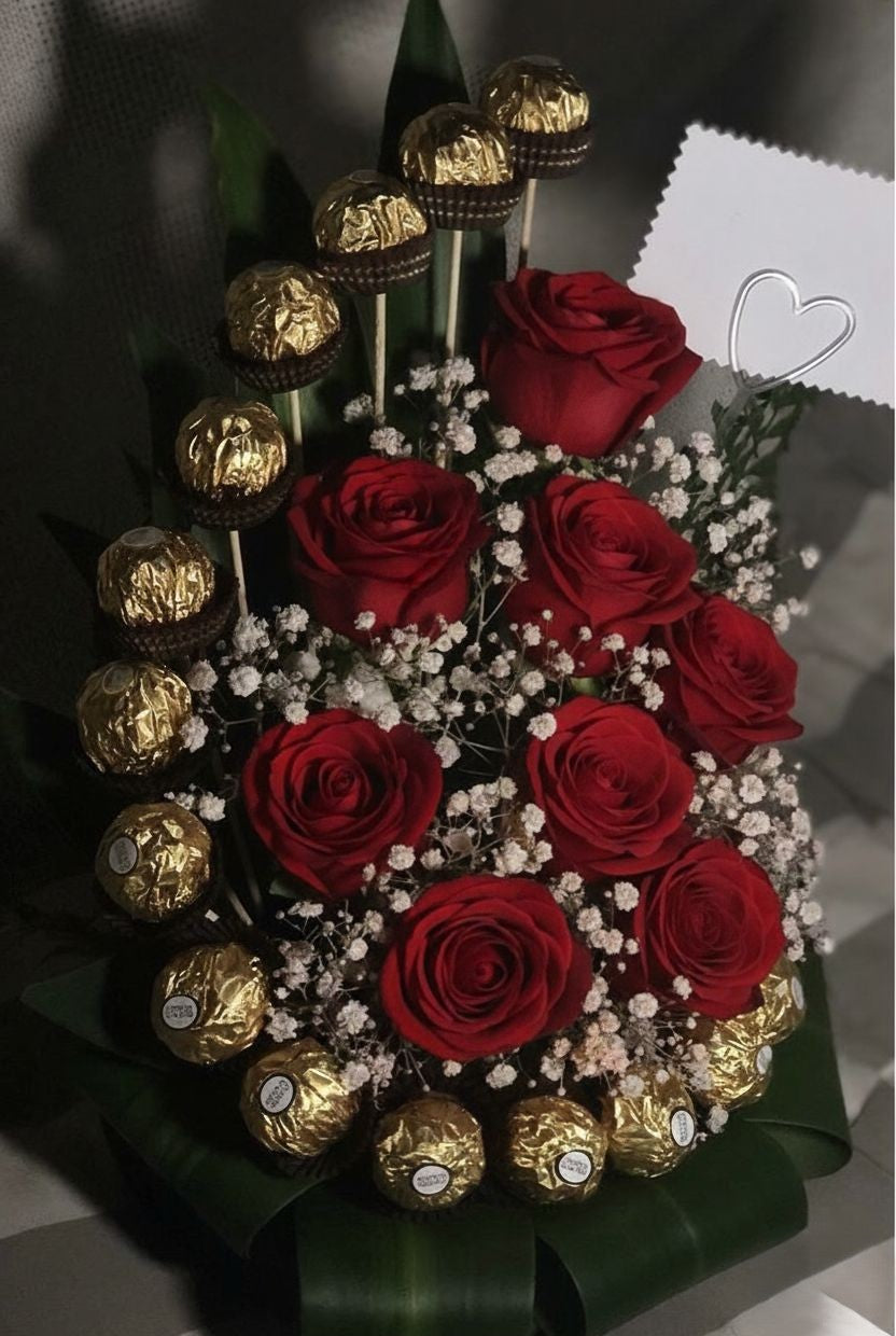 Edle Pralinen mit roten Rosen dekoriert